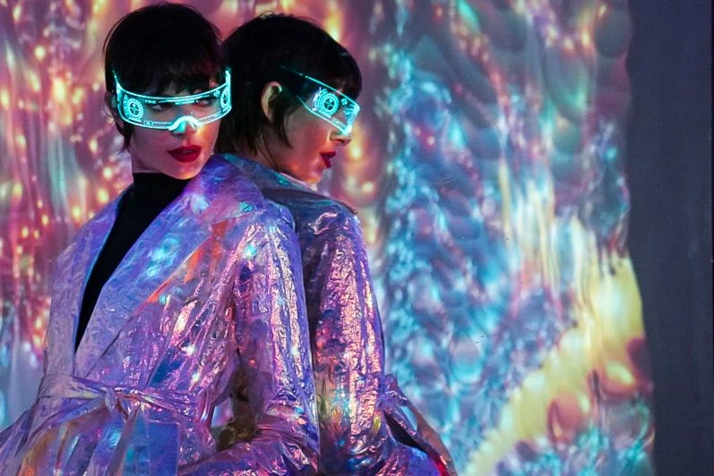 Creative portrait with reflective styling and projected light