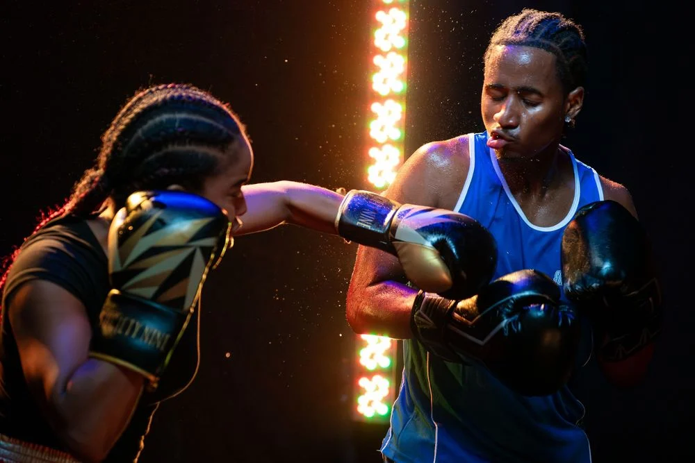 Action boxing portrait with dramatic rim lighting