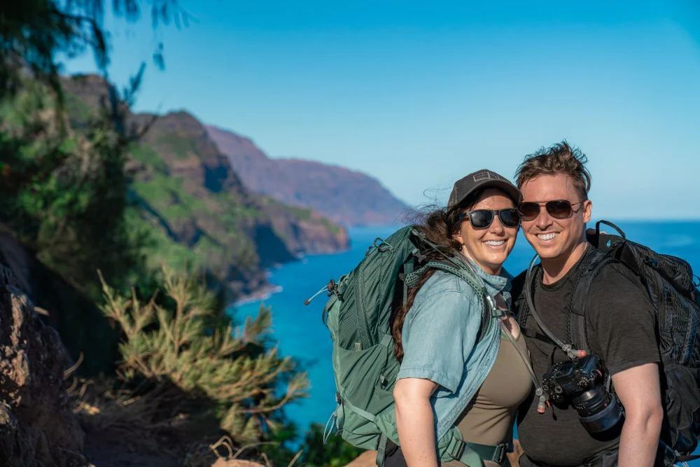Travelers on a coastal hiking trail