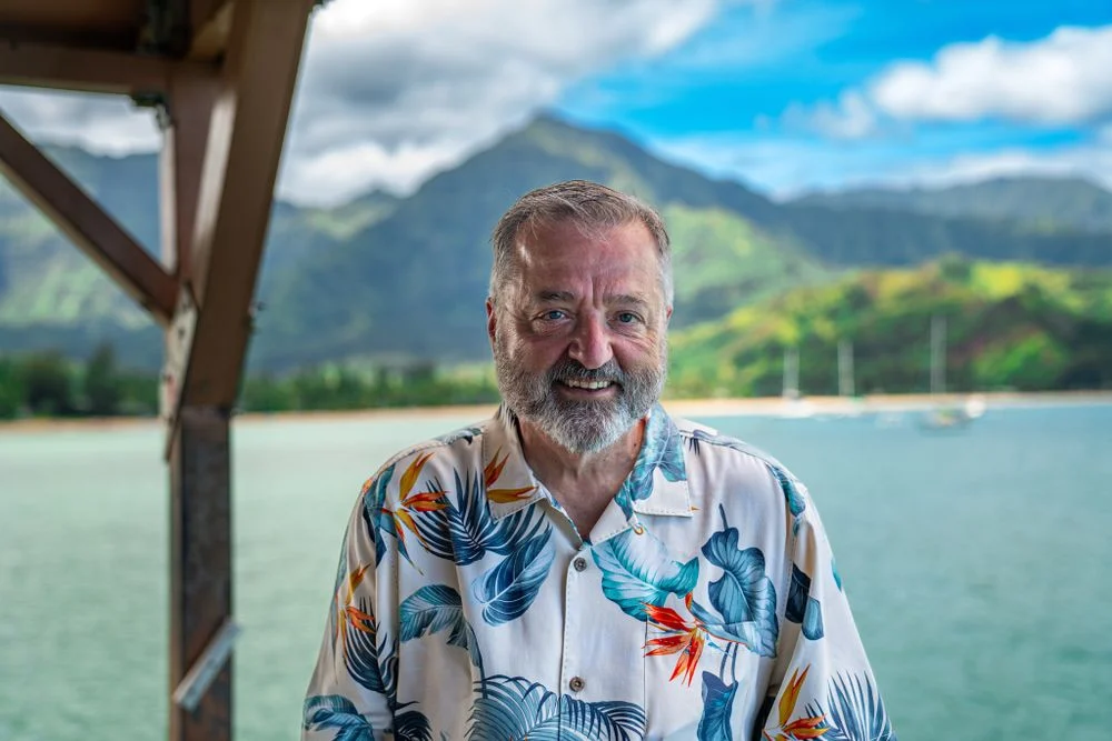 Environmental travel portrait near the water